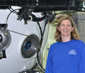 Marine scientist Amy Baco-Taylor next to a submersible in which she has conducted research.